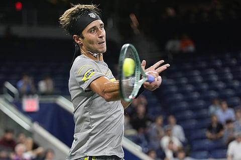 US Open 2024: Argentina's Tomas Martin Etcheverry returns a shot to Germany's Alexander Zverev